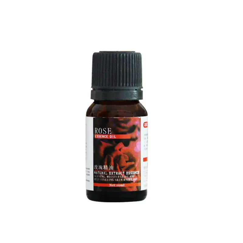 Bottle of rose essence oil with a black cap for Wood grain aroma diffuser, USB air humidifier with colored lights for desktop or office use

